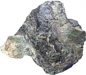 Photo showing a rock with some semi-glossy green streaks.